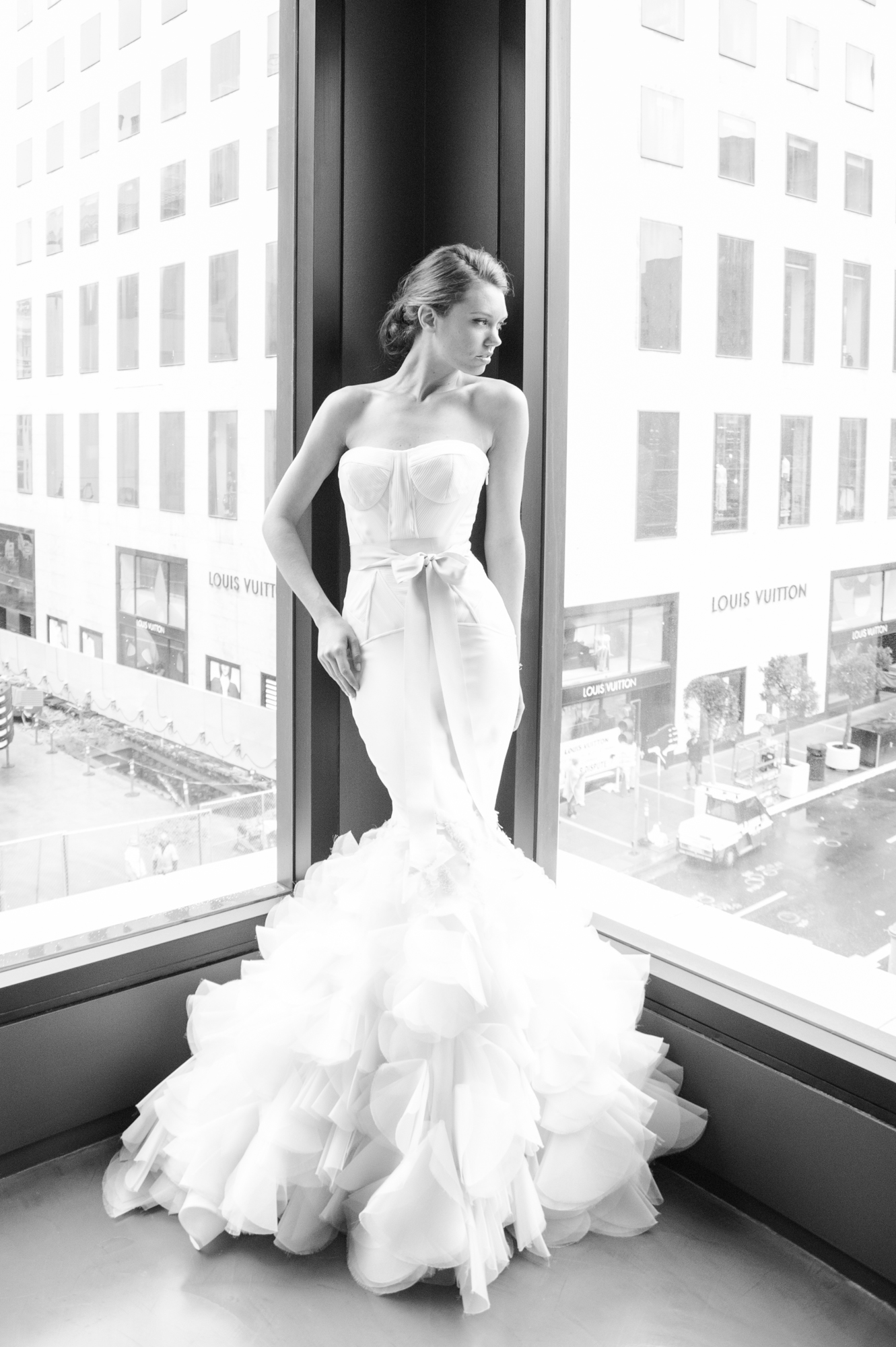 Bride with a soft, romantic updo styled by Patrick Evan Salon for Vera Wang